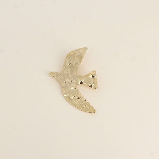 Pin’s oiseau texturé doré – Bohm Paris