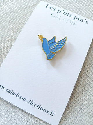 Pin’s colombe bleue émaillée – Caladia