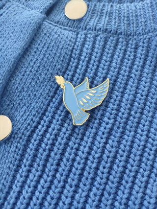 Pin’s colombe bleue émaillée – Caladia