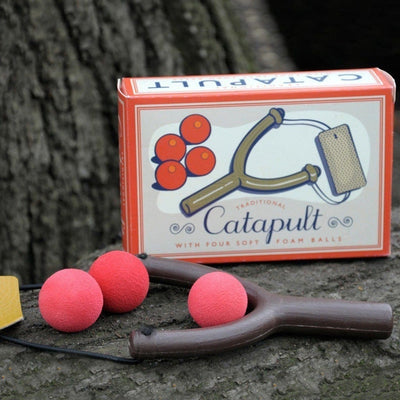 Catapulte et 4 boules en mousse
